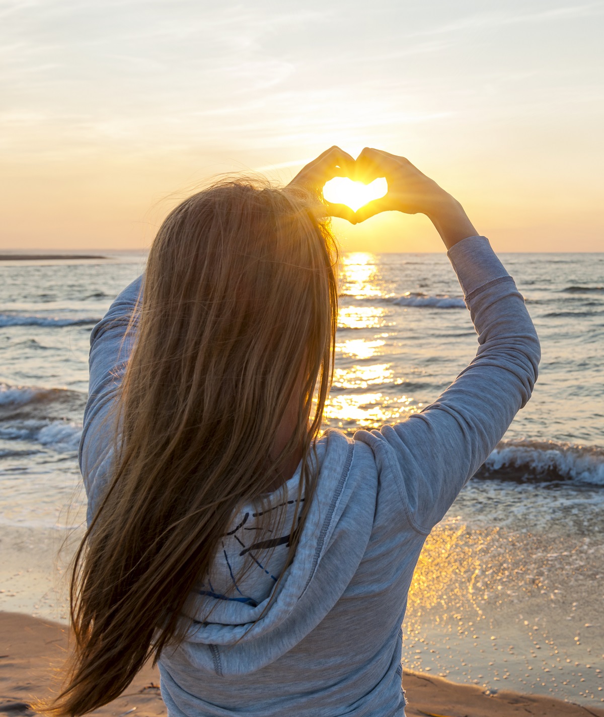 Hands-in-heart-shape@beach_dreamstime_xxl_33442027-CROP_vert