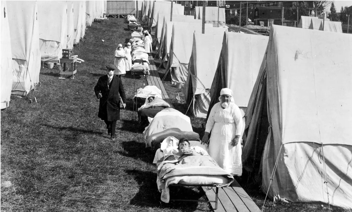 Influenza patients getting sunlight at the Camp Brooks emergency open-air hospital_NationalArchives